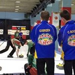 Youth curling players
